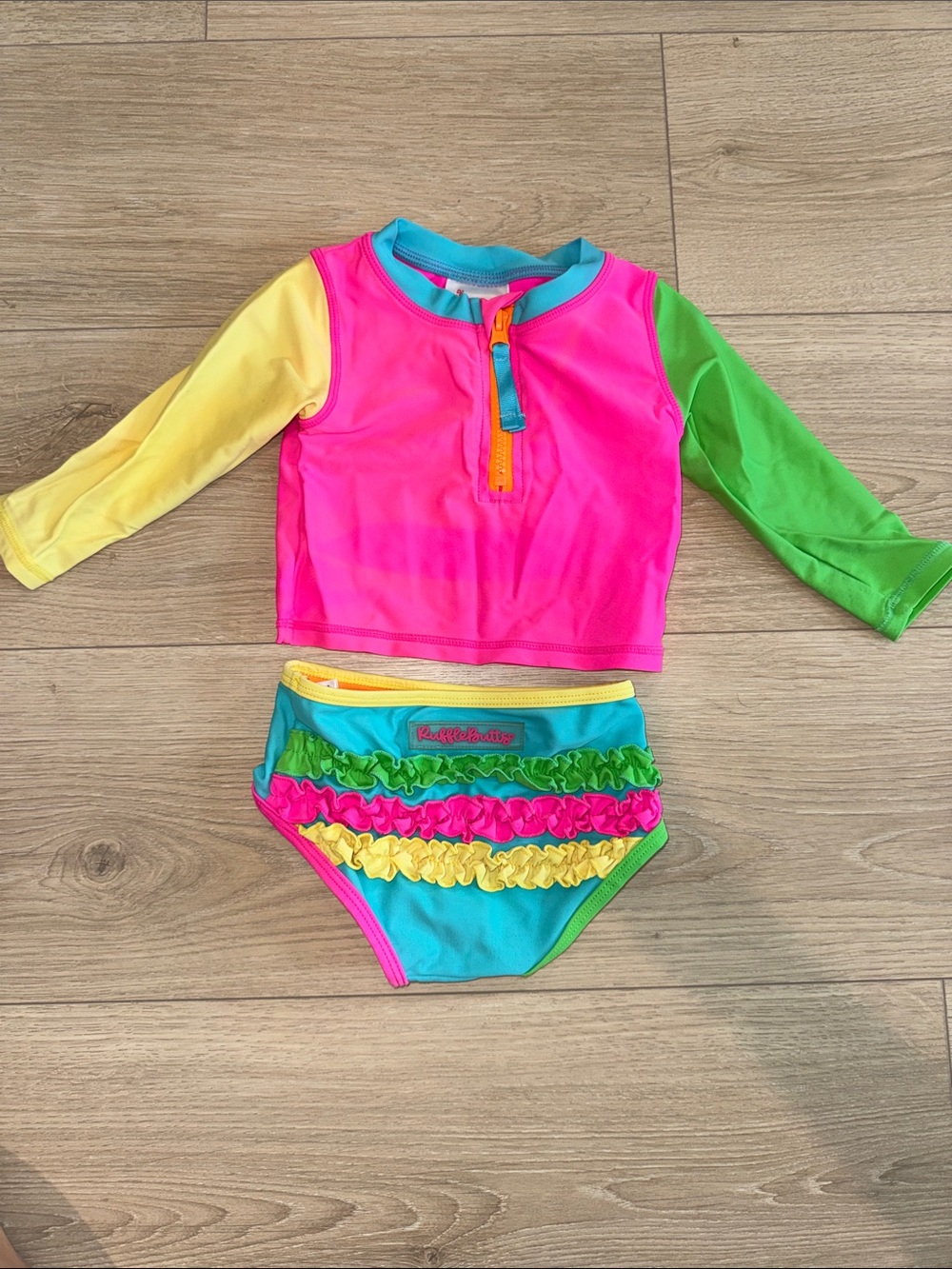 Ruffle Butts Bright Pink Rashguard Set with Teal, Yellow & Green